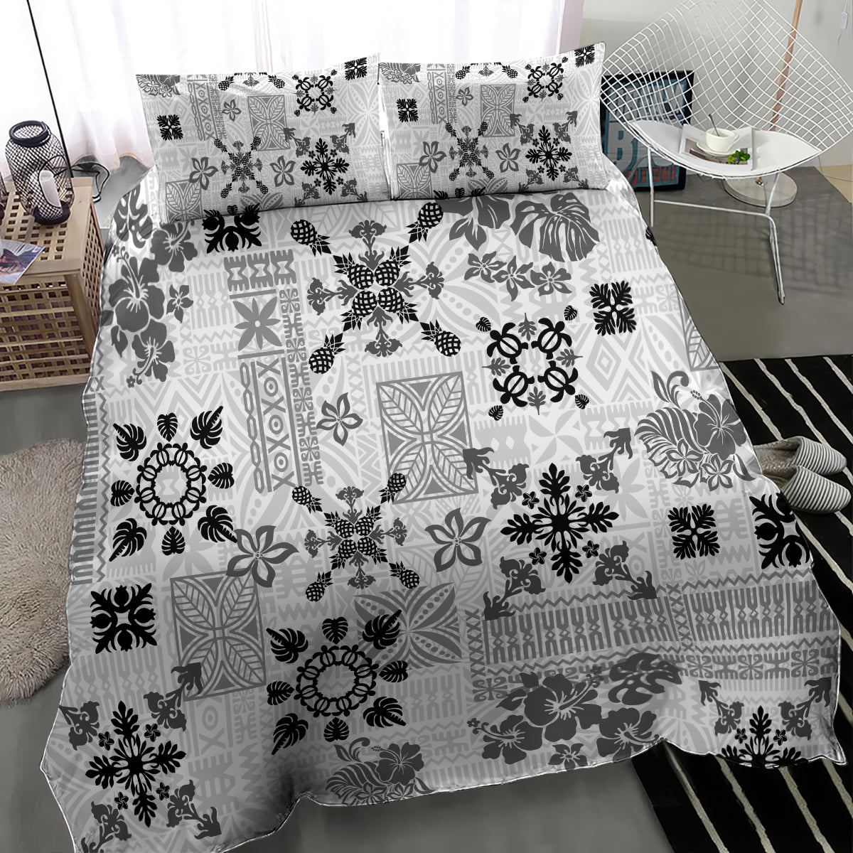 Black-and-white tribal print quilt bedding set with matching patterned pillowcases