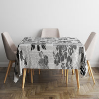 Rectangular tablecloth in black and white with tapa-style tribal quilt pattern