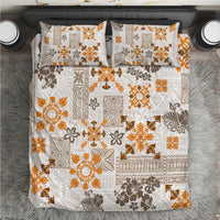 Gold and white tribal tapa bedding set with ornate quilt pattern and pillow covers