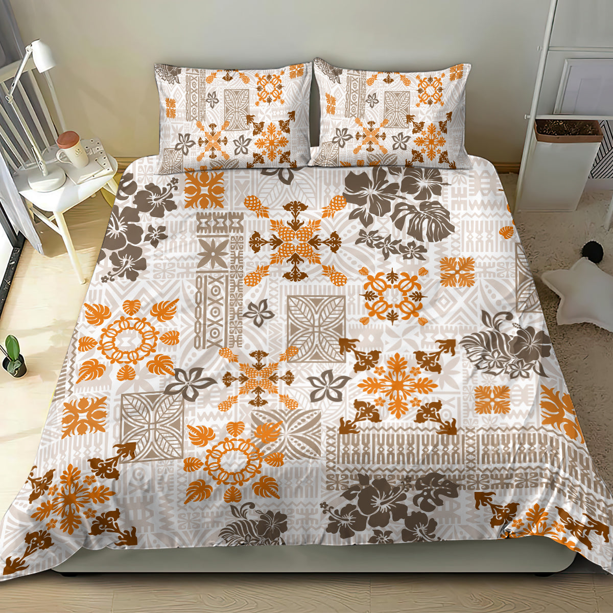 Gold and white tribal quilt bedding set featuring tapa-inspired geometric and floral pattern