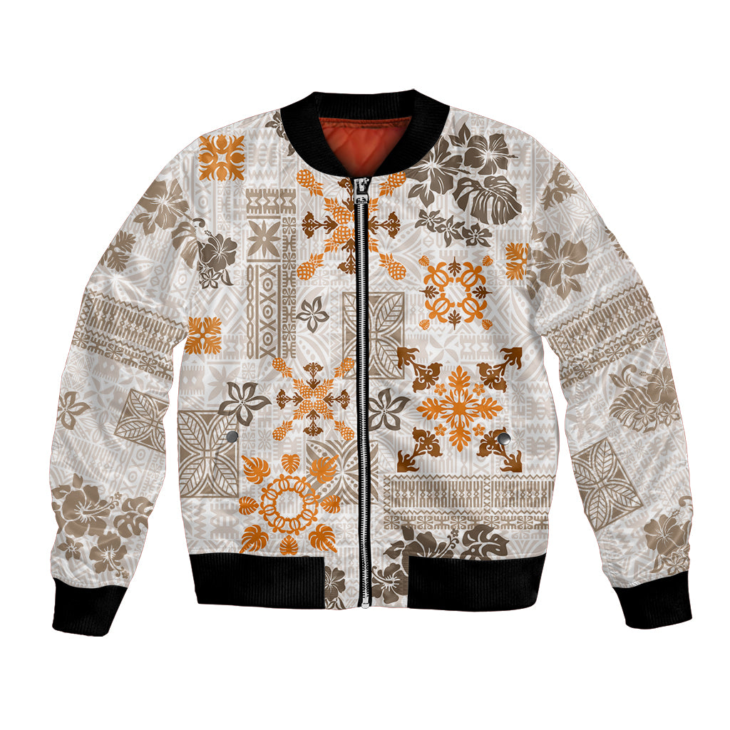 Unisex bomber jacket with white base, orange floral tribal quilt pattern, black rib trim.