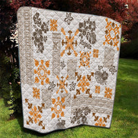 Orange and dark Hawaiian tapa quilt with diamond quilting and floral geometric design