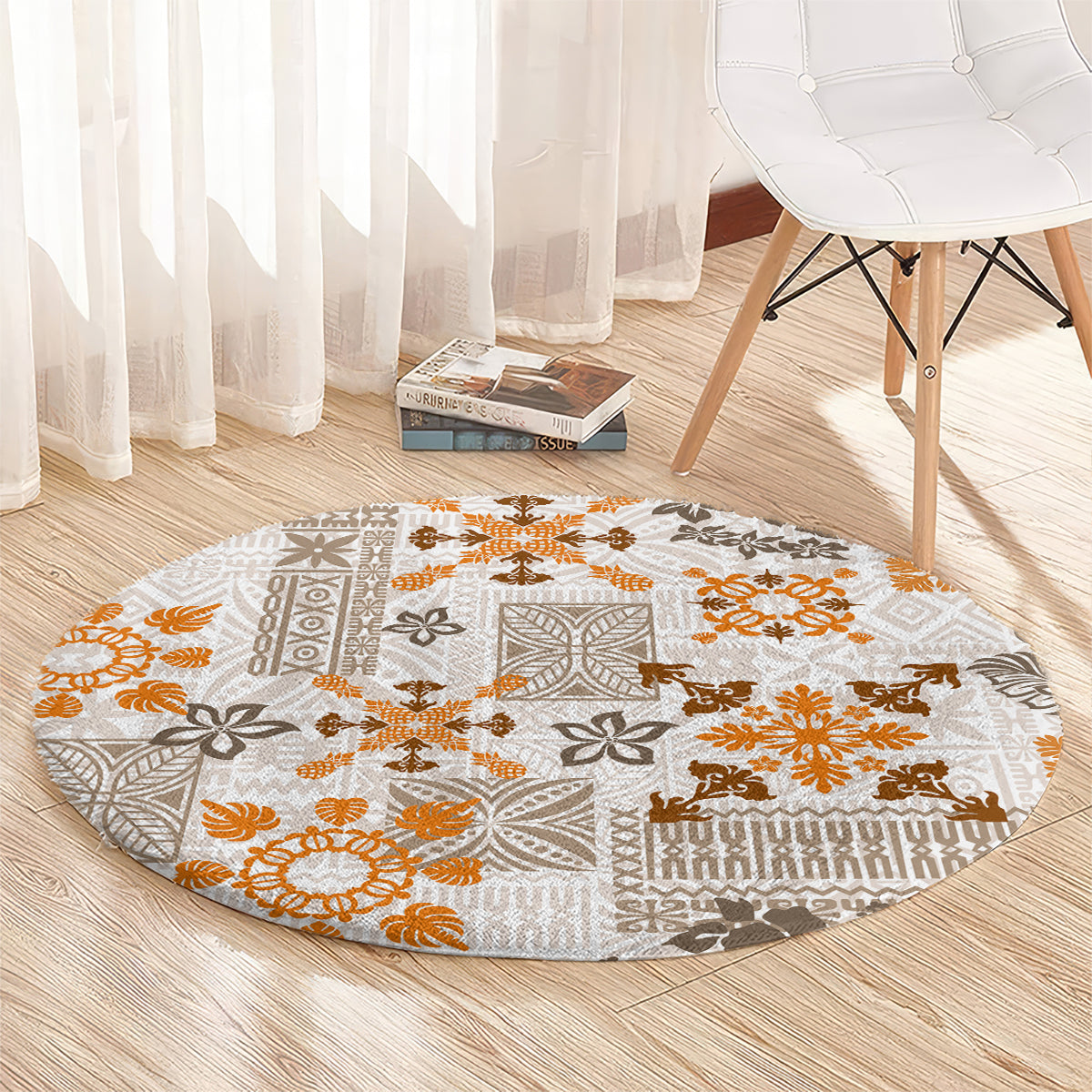 Round area rug with beige field and orange-brown tapa tribal quilt pattern, textured border