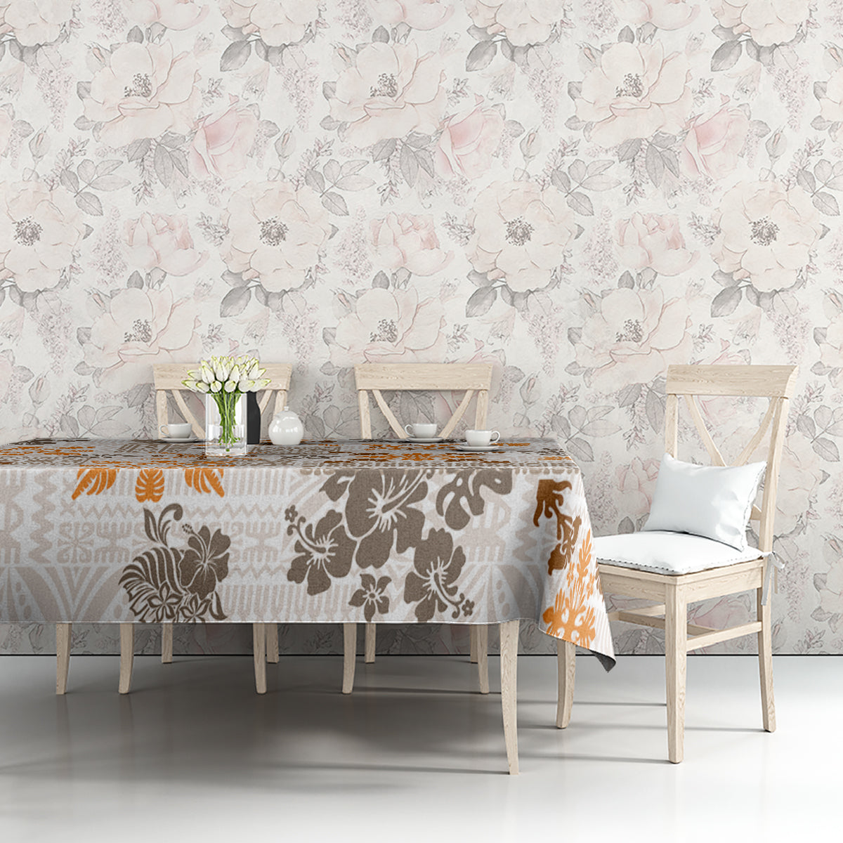 Rectangular tapa tribal tablecloth with brown floral motifs and orange accents on off-white.