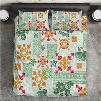 Green Hawaiian quilt bedding set with tapa tribal pattern and colorful floral prints