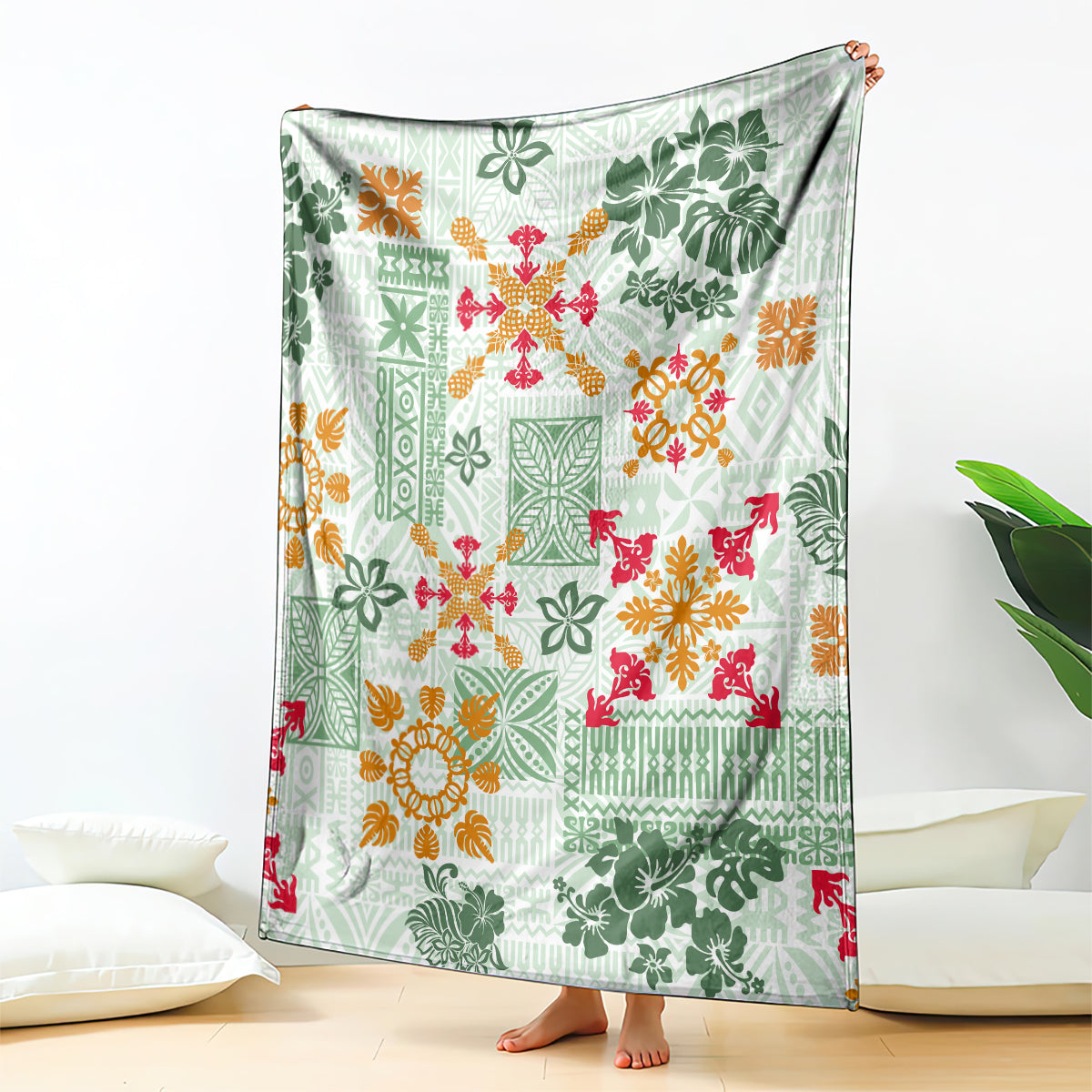 Green tropical tapa tribal blanket with multicolor floral quilt pattern and leaf motifs