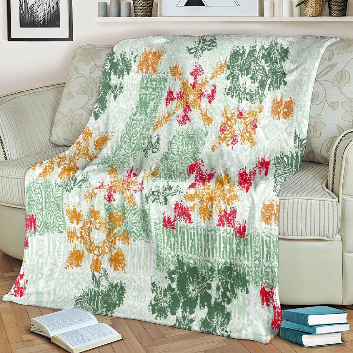 Green tapa tribal blanket draped on a sofa with bright floral quilt pattern