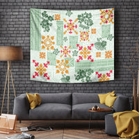 Green Hawaiian quilt-pattern tapestry with floral and geometric patchwork design