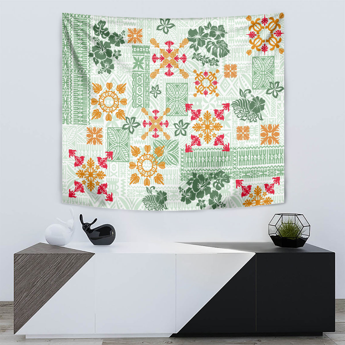 Green Hawaiian quilt-pattern tapestry with floral and geometric patches, wall-mounted