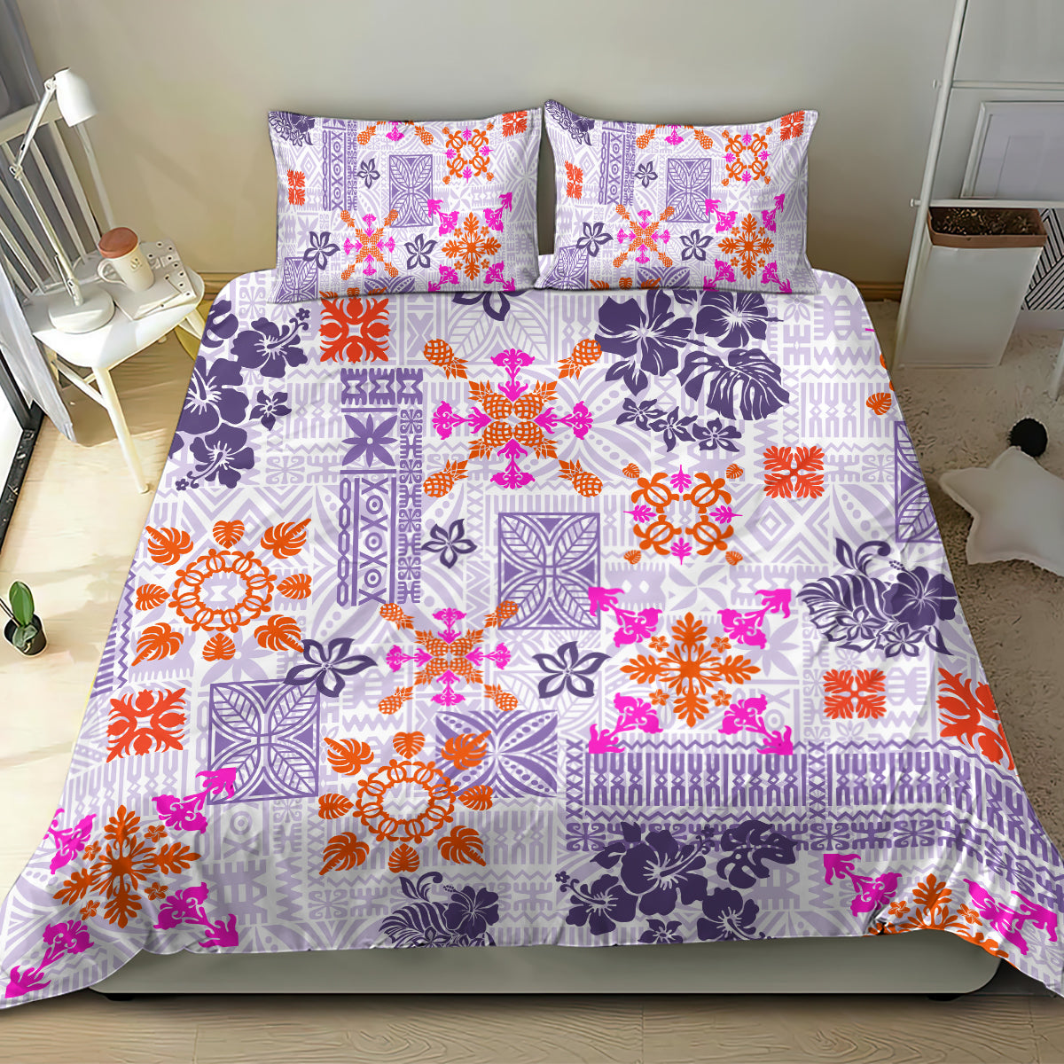 Violet tapa tribal quilt set with two pillow shams and colorful geometric motifs.