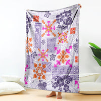 Violet Hawaiian quilt-style blanket with orange, pink, and purple floral tapu patterns