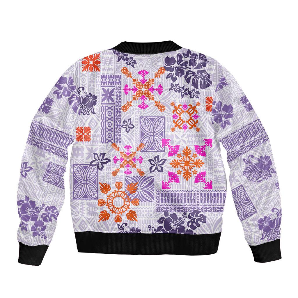 Violet Hawaiian bomber jacket with quilted tapa patterns, bright orange and pink accents