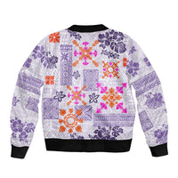 Violet Hawaiian bomber jacket with quilted tapa patterns, bright orange and pink accents