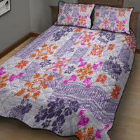 Violet Hawaiian quilt bed set with two matching pillows and bold floral Tapa pattern