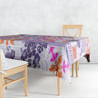 Violet patchwork tablecloth with purple floral motifs and orange pink accents