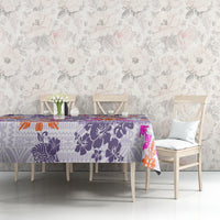 Violet tablecloth showing patchwork floral pattern in purple, orange, and pink
