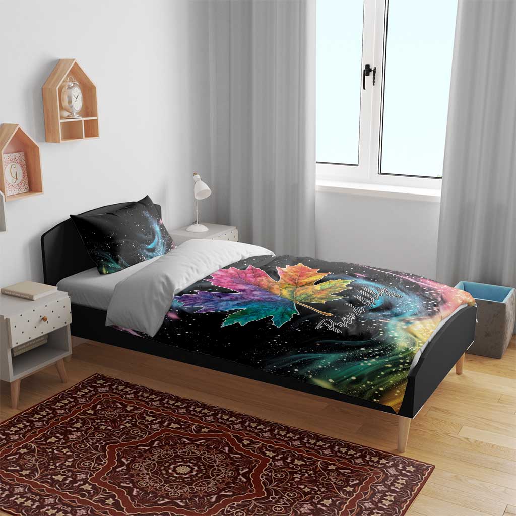 Black duvet and pillowcases with rainbow maple leaf galaxy swirl print and 'Proud Ally' text