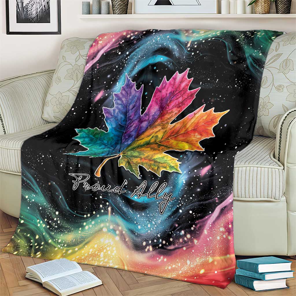 Black rainbow maple leaf blanket draped on sofa with starry galaxy background