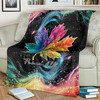 Black rainbow maple leaf blanket draped on sofa with starry galaxy background
