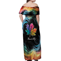 Women's black off-shoulder maxi dress, back view, rainbow galaxy with maple leaf graphic