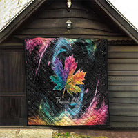 Black quilt on barn wall with rainbow maple leaf, galaxy swirls, and star-speckled pattern
