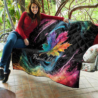 Black quilt blanket with rainbow maple leaf and galaxy swirl, star-speckled specks