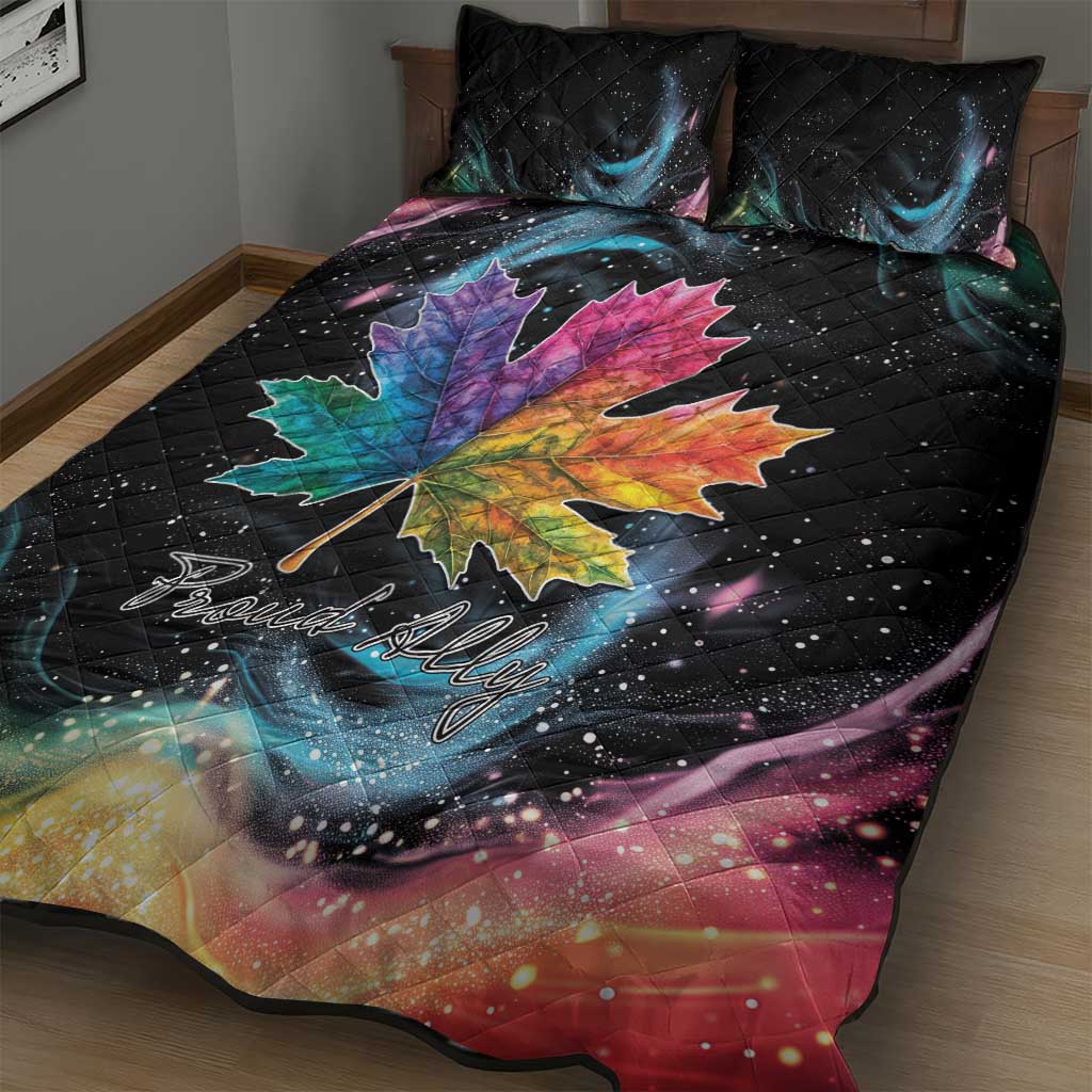 Black quilt bed set with large rainbow maple leaf, 'Proud Ally' script, starry galaxy