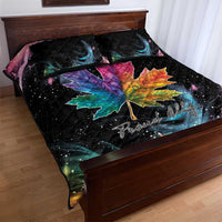 Black quilt bed set with rainbow maple leaf motif and starry galaxy print, on bed
