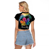 Black cropped raglan T-shirt with rainbow maple leaf graphic on back