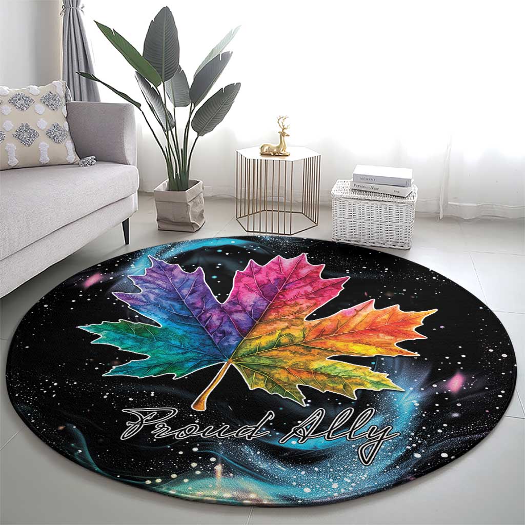 Black round area rug with galaxy-speckled background, colorful maple leaf, 'Proud Ally'