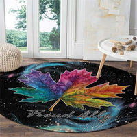 Black round rug with galaxy speckles, multicolor maple leaf, and 'Proud Ally' text