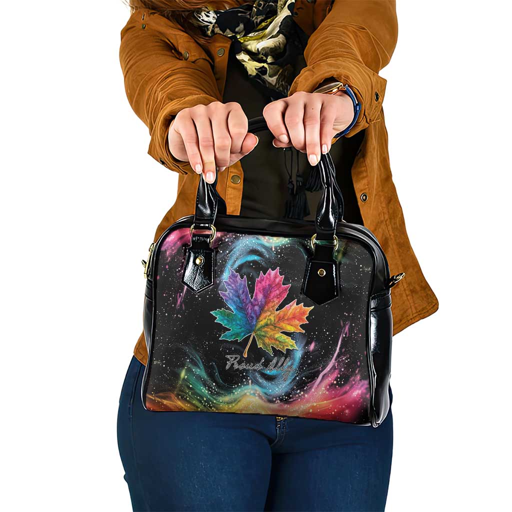 Black shoulder handbag with rainbow maple leaf galaxy print, top handles and zipper