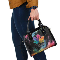 Black shoulder handbag with rainbow maple leaf galaxy print, side view with handles