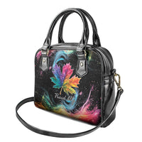 Black satchel-style handbag with rainbow maple leaf galaxy print and shoulder strap