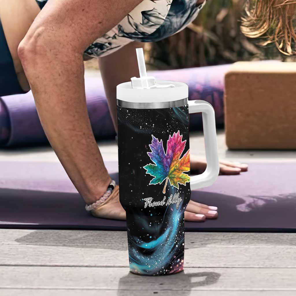 Black travel tumbler with handle and straw lid, rainbow maple leaf galaxy print
