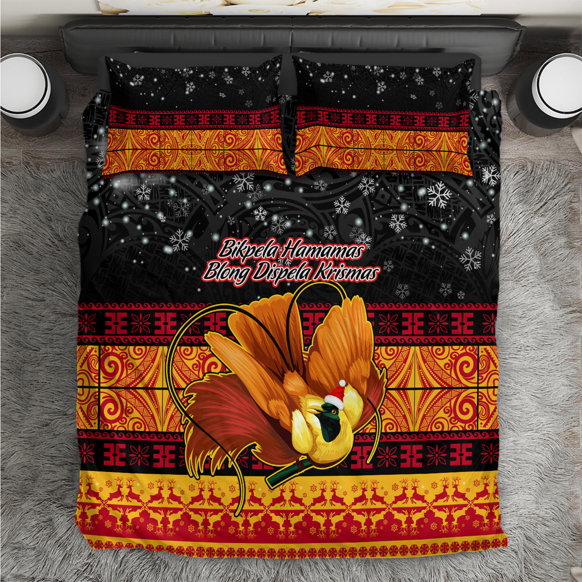 Black holiday bedding set with golden bird-of-paradise center graphic and red patterned borders