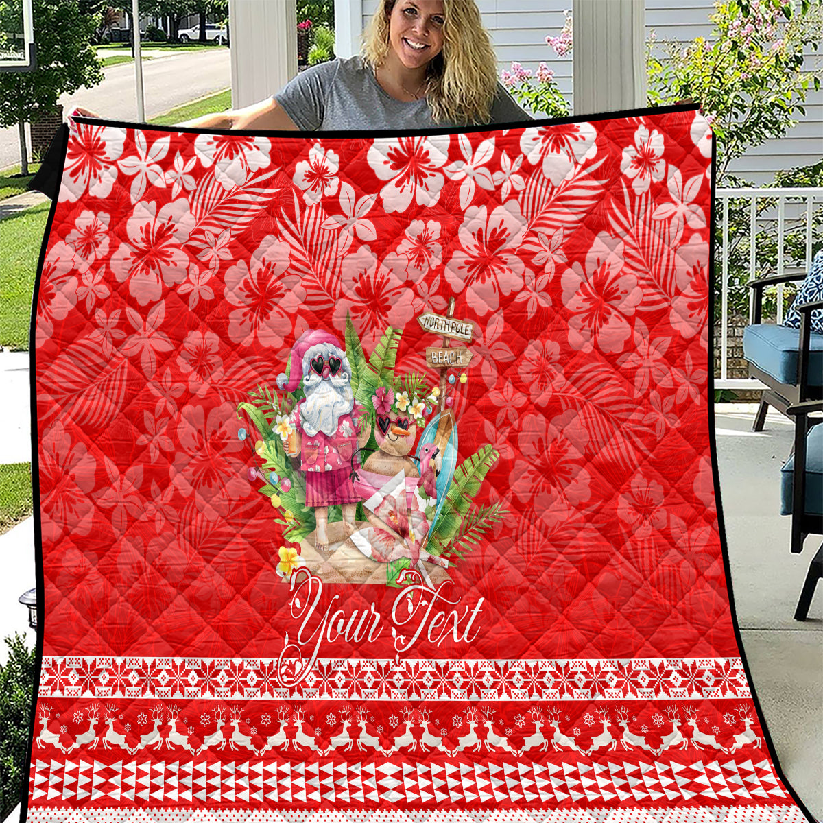 Red quilt with floral print, Santa beach character center, and white patterned border