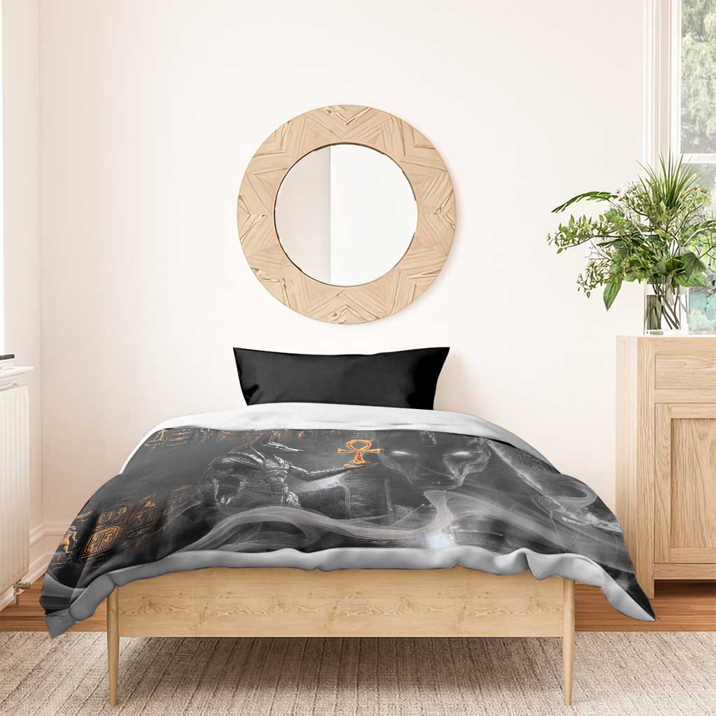 Black Egyptian Anubis duvet with orange ankh and gold symbols, one black pillow