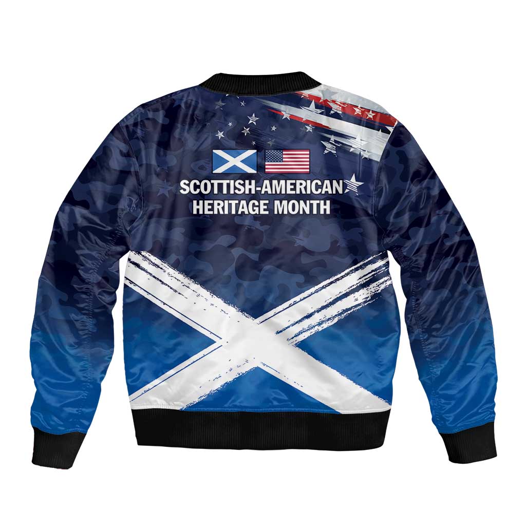 Blue bomber jacket with ribbed cuffs and large back graphic of American-Scottish flag and text