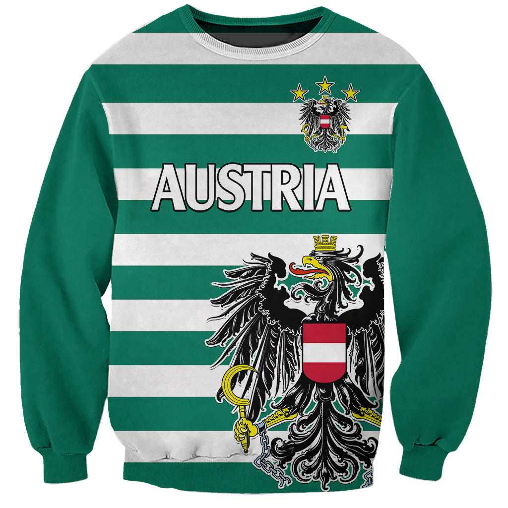 Green sweatshirt with Austria crest and bold “AUSTRIA” lettering over striped graphic