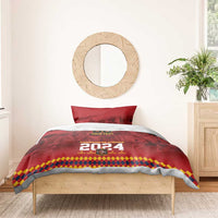 Red bedding set with duvet and pillow sham showing “Campeon de Europa 2024” and diamond-pattern edge