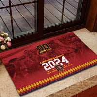 Red rubber doormat on front step with custom '00' text and Europa 2024 emblem