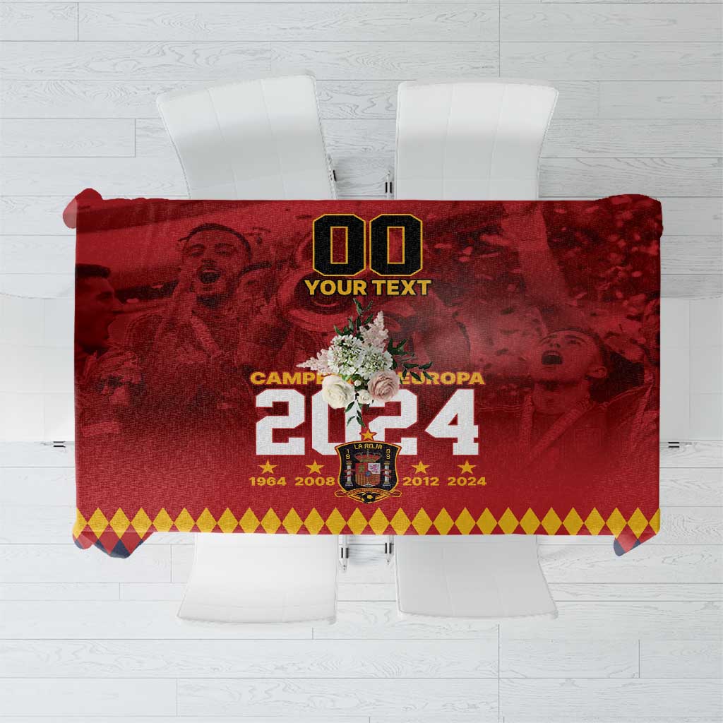 Red rectangular tablecloth with yellow and blue diamond border and central 2024 crest graphic