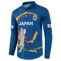 Blue button-front cricket sweatshirt with Japan banner and player action graphic, flag sleeve.