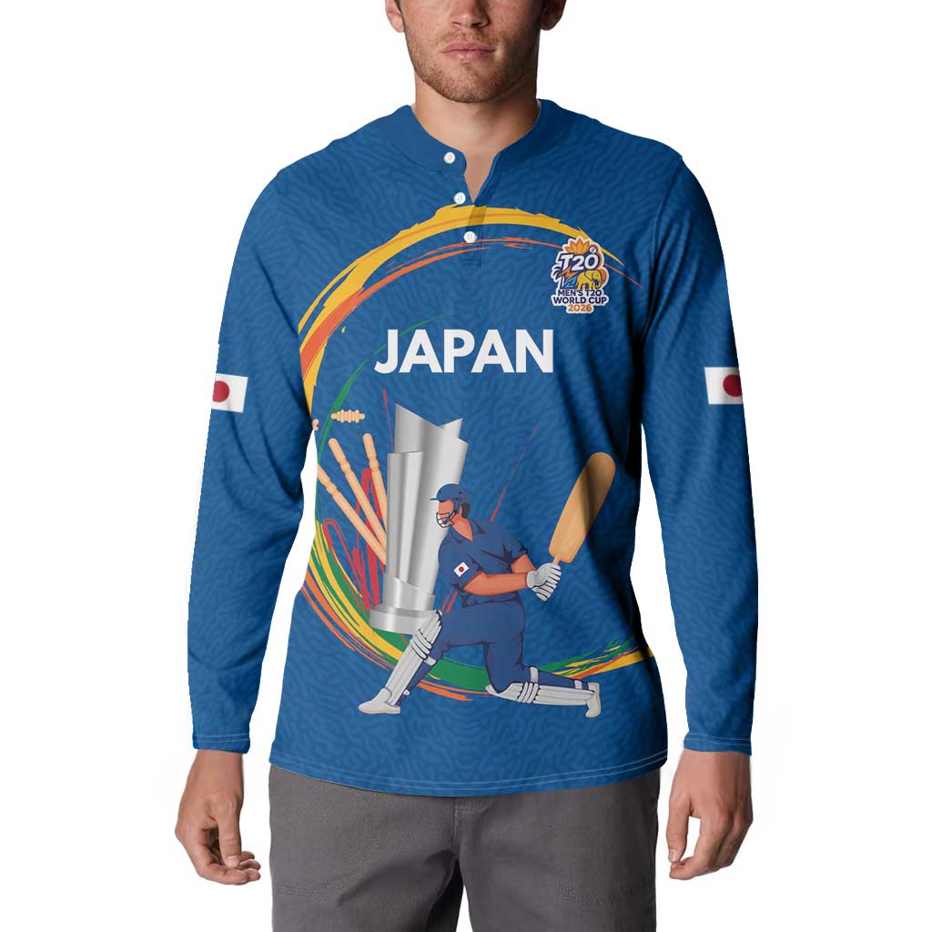Blue button-front cricket sweatshirt with Japan crest and player bat-and-stump artwork.