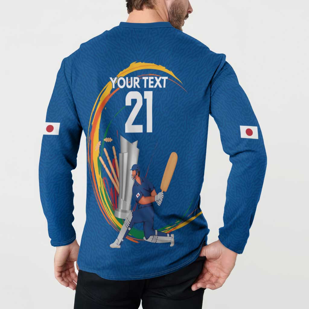 Blue cricket sweatshirt back with "YOUR TEXT 21" and player graphic, Japan flags on sleeves.