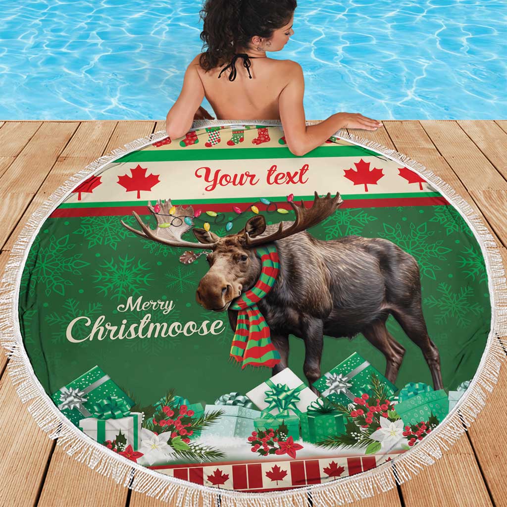 Round Christmas moose beach blanket with green moose print, shown on wooden deck
