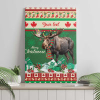 Green canvas wall art with a moose in a red plaid scarf and maple leaf holiday design