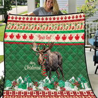 Personalized Christmas moose quilt with green quilted fabric, red border and “Merry Christmas” text
