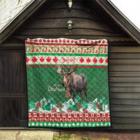 Personalized Christmas moose quilt hung indoors, green quilted design with moose and “Your text”